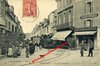 ARGENTON (36) - La Rue Gambetta - Gros plan animé, magasins, tramway à vapeur dans la rue - ND 63
