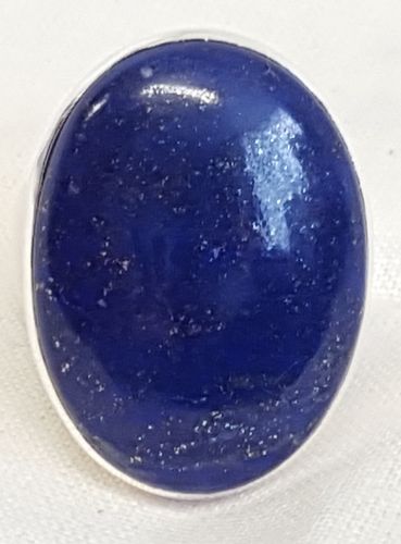 LAPIS-LAZULI - bague formée d'un cabochon ovale en lapis-lazuli 27 x 20 mm environ