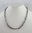 LABRADORITE - Collier en labradorite composé de perles facettées forme bouton